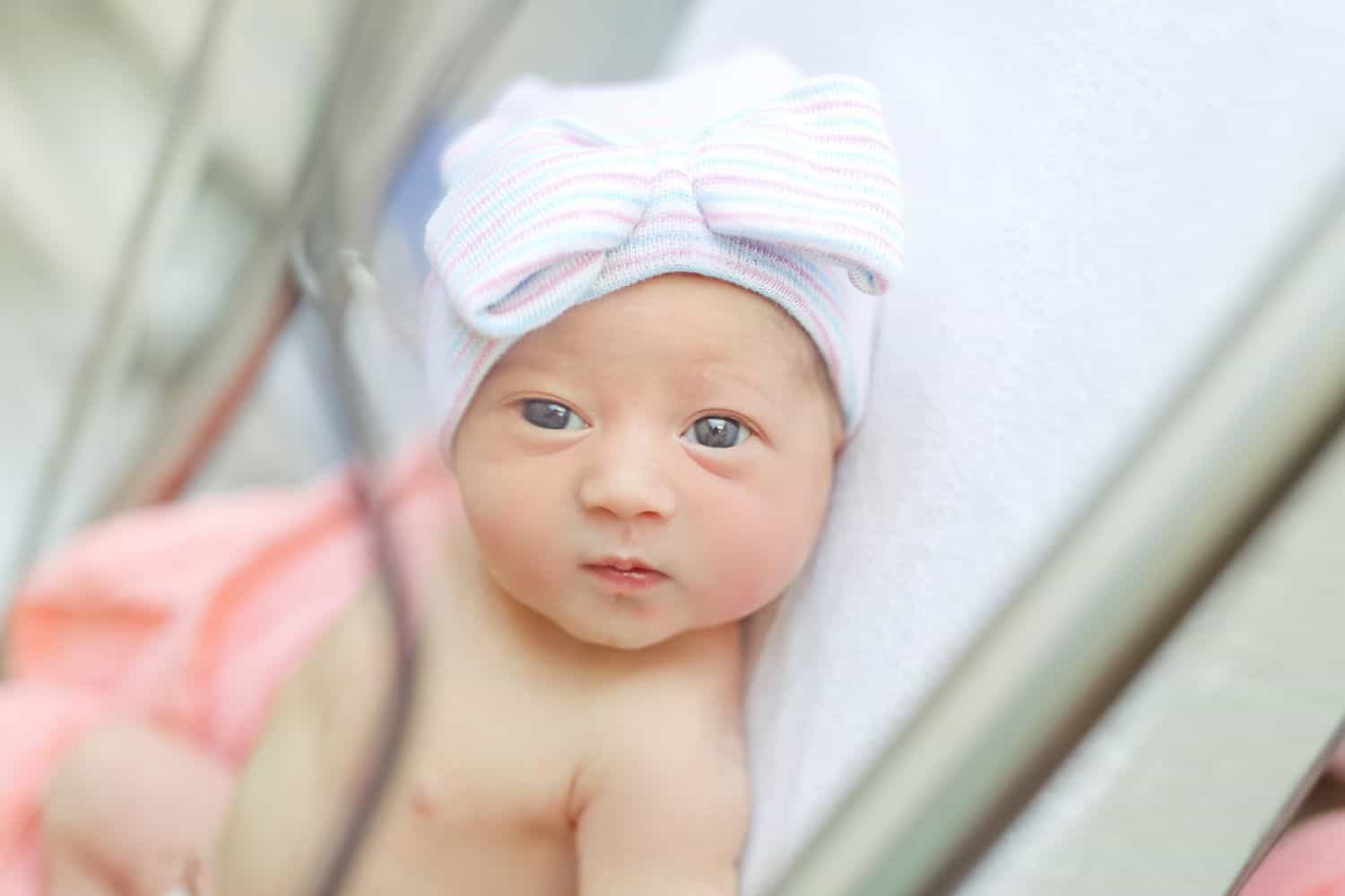 How To Attract New Clients In 3 Bold Business Moves: Newborn in hospital by Cassie Clayshulte