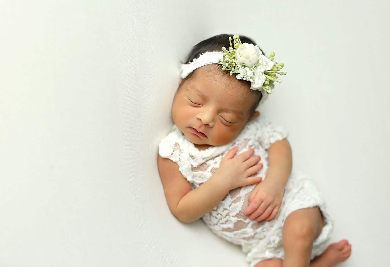 How To Attract New Clients In 3 Bold Business Moves: Baby with flower headband by Cassie Clayshulte
