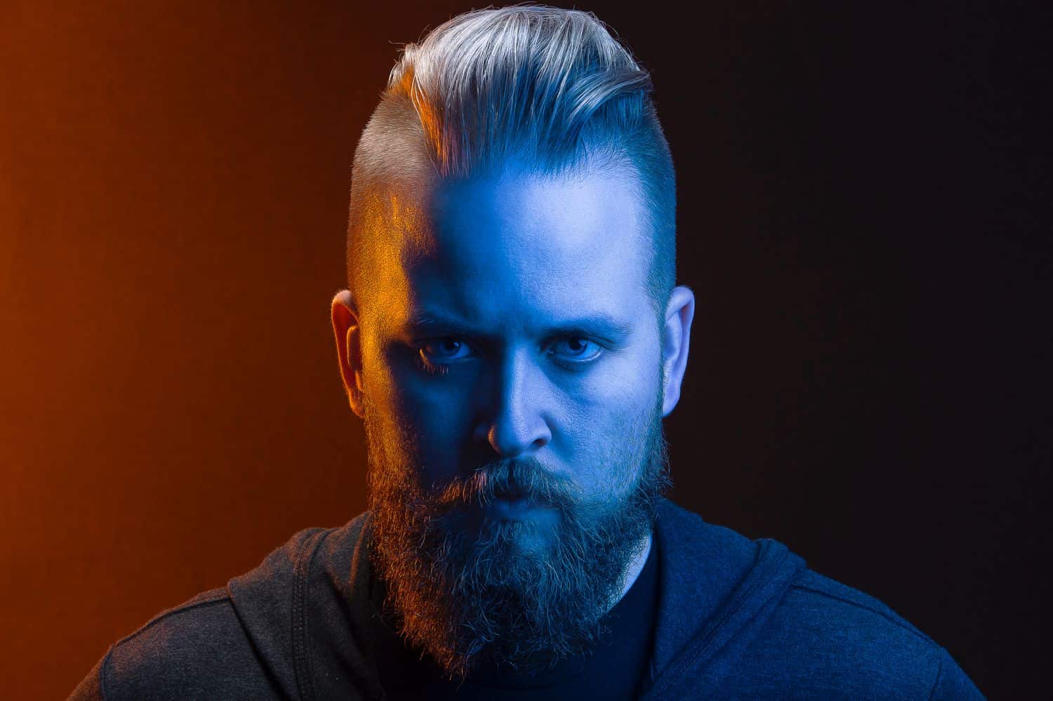 Freedom to create: photographer and digital artist Ryan Sims in blue and red lights.