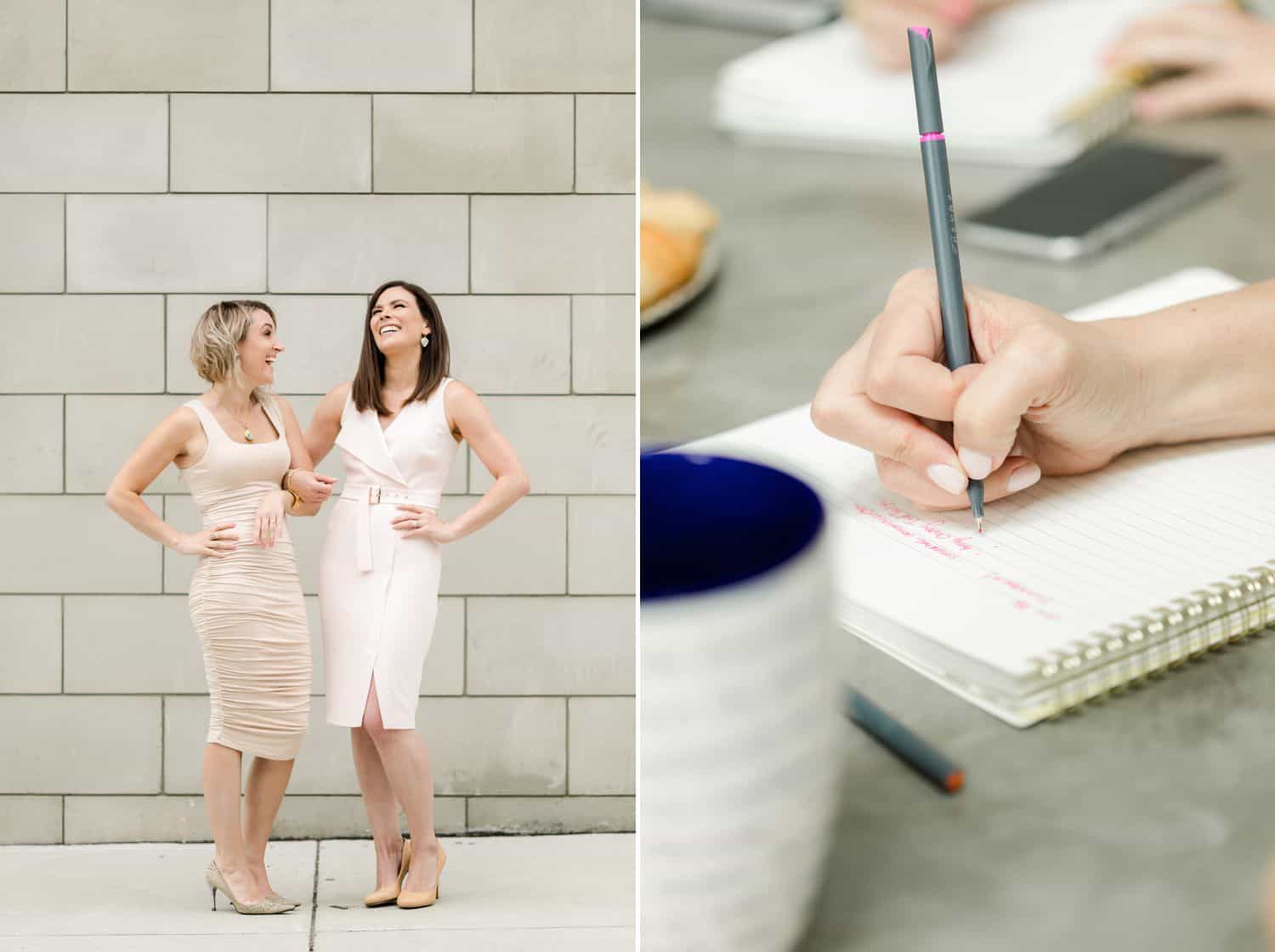 Two business women strike power poses and take notes during a meeting.