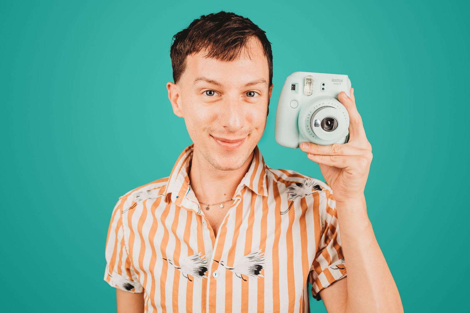 Guy holding a camera