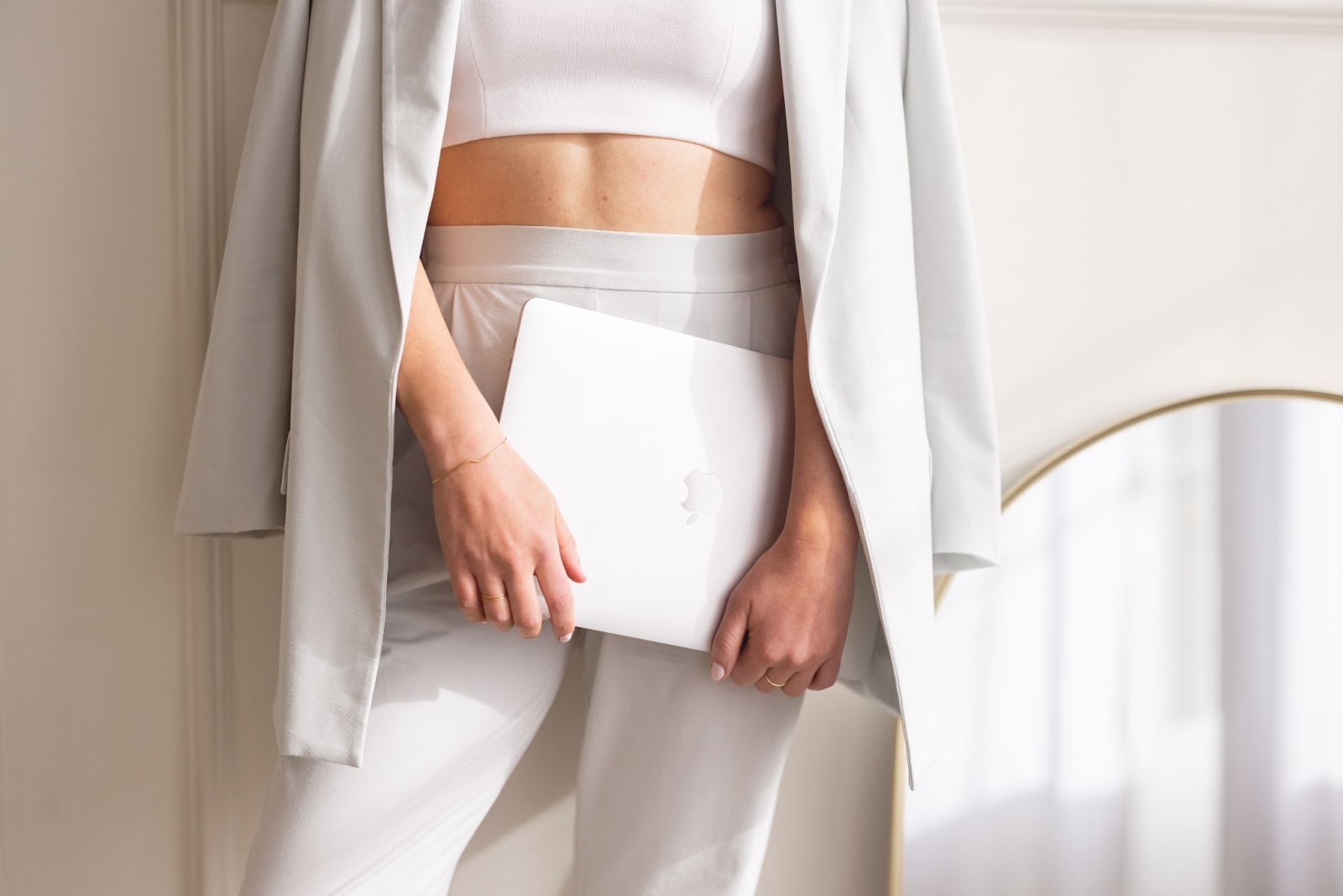 Lifestyle photo of woman's white outfit