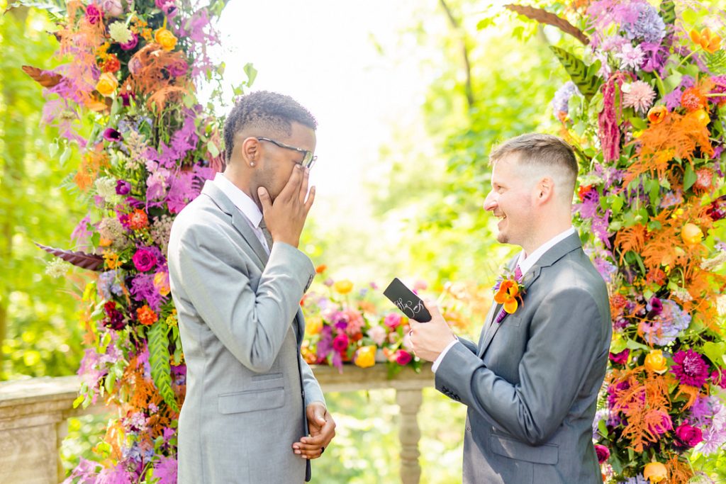 men reading vows at wedding