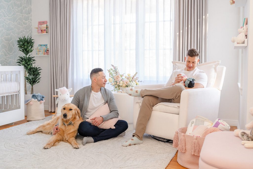 couple with baby and dog