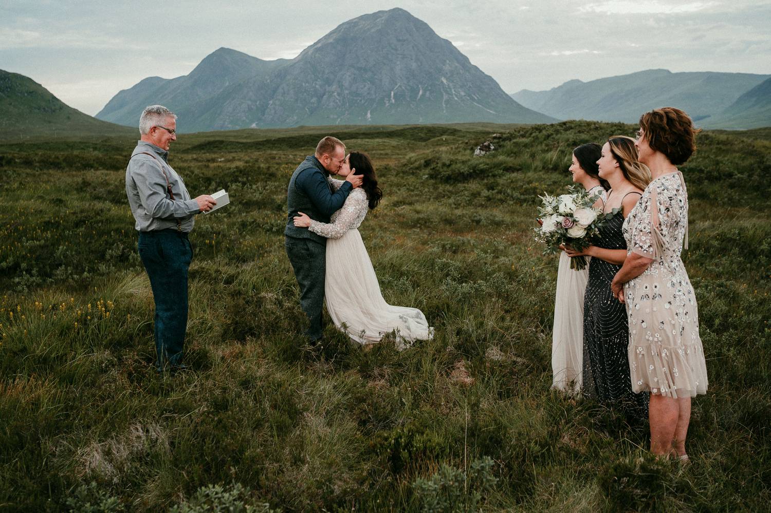 A bride and groom elope in the grassy plains of Ireland with only their minister, three attendants, and Rob Dight, their photographer.
