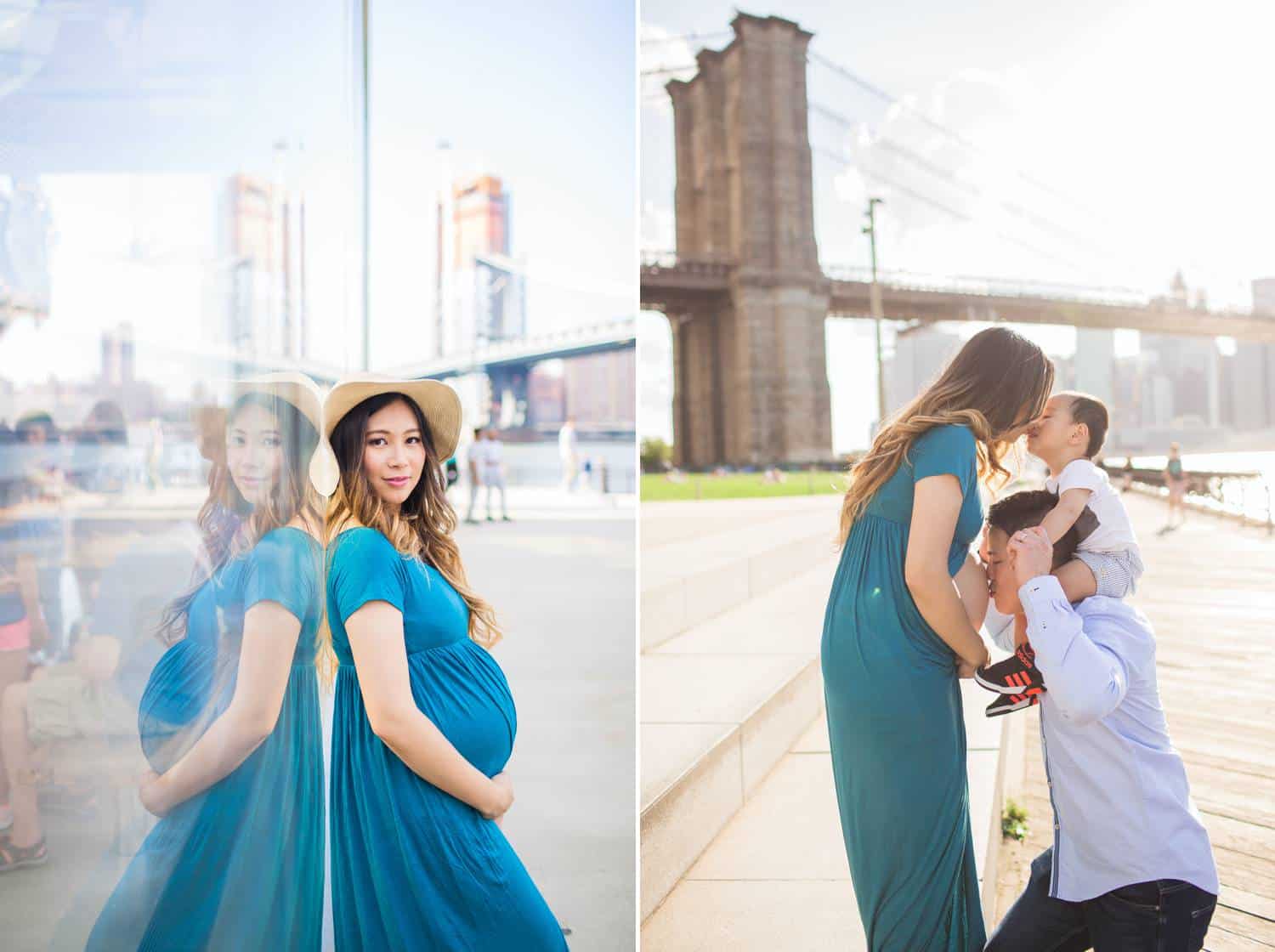 A pregnant woman in a teal blue gown poses first against a glass wall, where her reflection echos her pose. Next, she poses in a portrait with her partner and child. The child sits on the partner's shoulders, and Mom leans in to kiss the baby on the forehead. The Brooklyn Bridge appears in the background.
