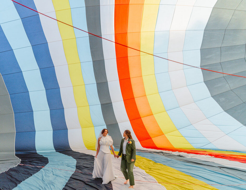 couple in front of ballon
