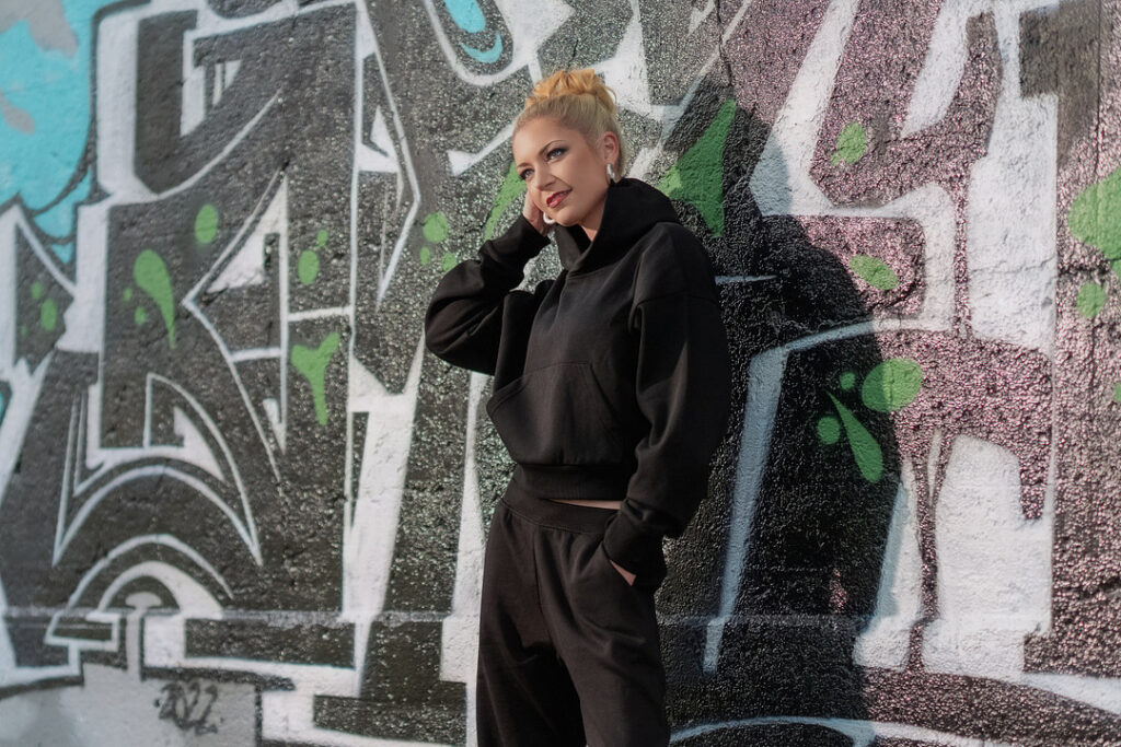 woman standing against wall
