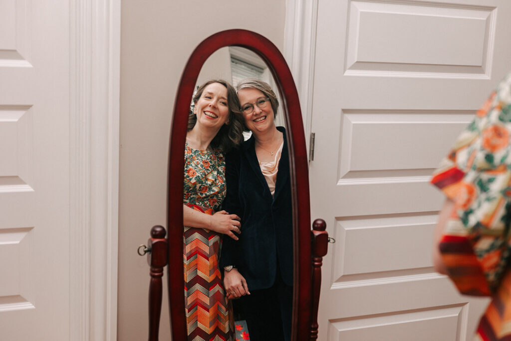 two women in a mirror